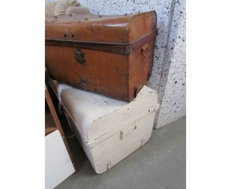 An old tin trunk containing Christmas decorations