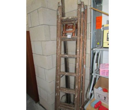 A triple extension wooden ladder