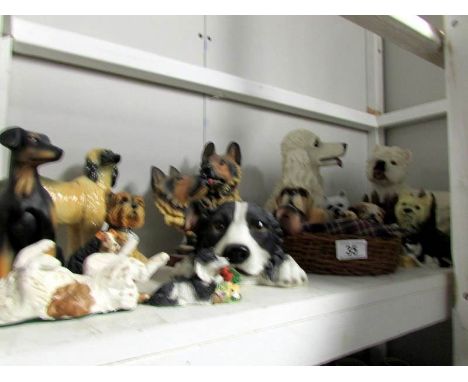 A shelf of various dog figures
