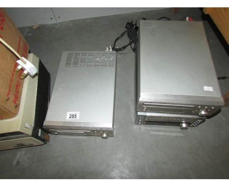 A mini disk recorder, a cassette deck and a CD player