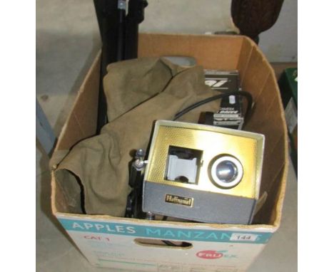A box of photographic items including slide projector