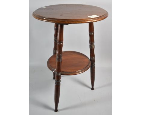 An Edwardian Mahogany Circular Topped Occasional Table with Stretcher Shelf, 37cms Diameter 