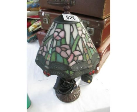 A small Tiffany style lamp