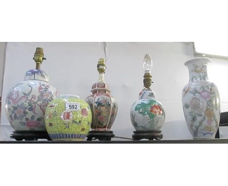 A Chinese ginger jar, a vase and three Oriental style lamp bases