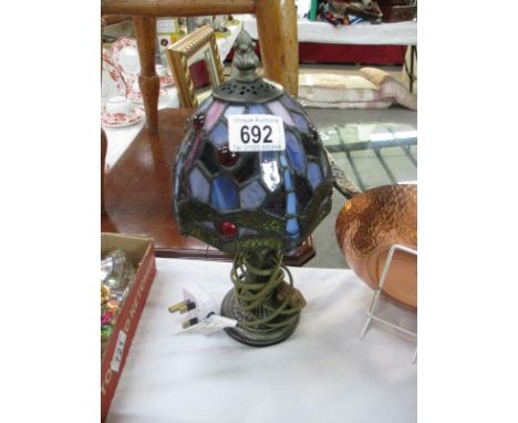 A small Tiffany style lamp