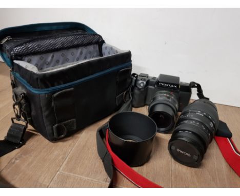 BAG CONTAINING PENTAX SF7 CAMERA TOGETHER WITH SIGMA CAMERA LENS