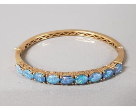 GOLD PLATED OPAL TRIPLET BANGLE, 9 OPALS