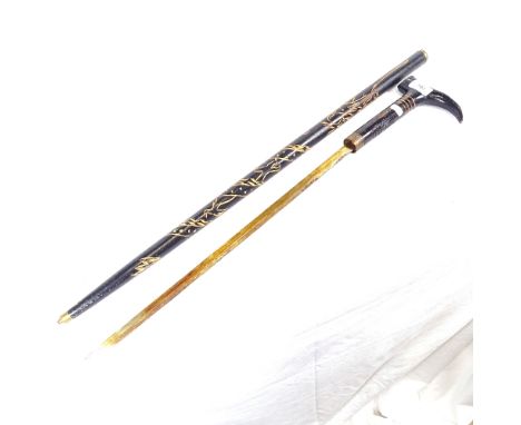 An Oriental carved hardwood swordstick, blade length 50cm 