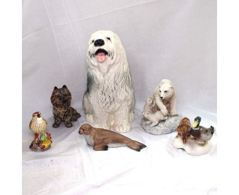 A Royal Worcester thrush, a Sylvac Terrier, and Old English Sheep dog 