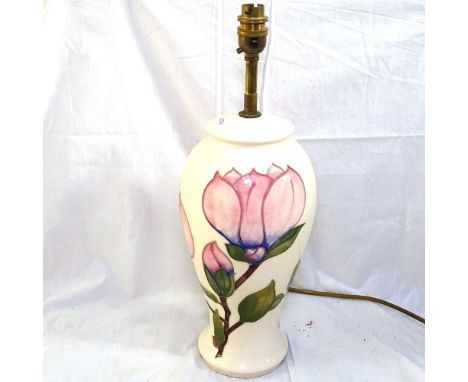 A Moorcroft table lamp with tube-lined peony decoration, height 44cm overall 