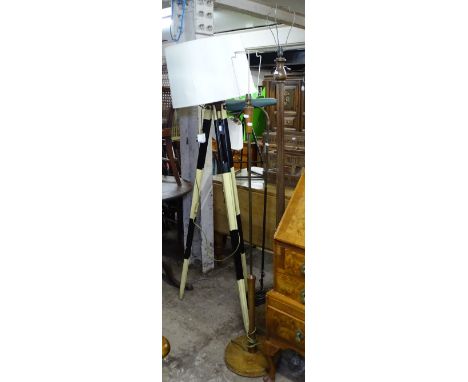 A reproduction standard lamp, in the form of a Surveyor's tripod, and 3 others 