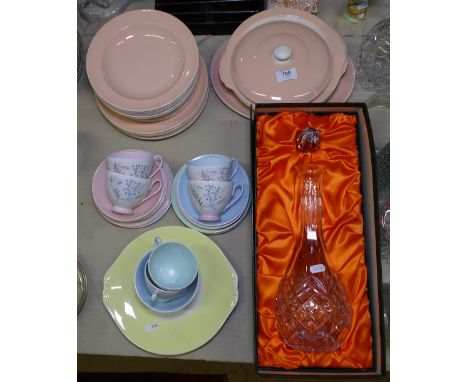 A crystal decanter and stopper, Poole Pottery dinnerware, and Queen Anne teaware 