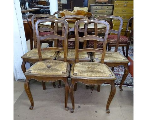 A set of 5 French oak ladder-back rush-seated dining chairs 