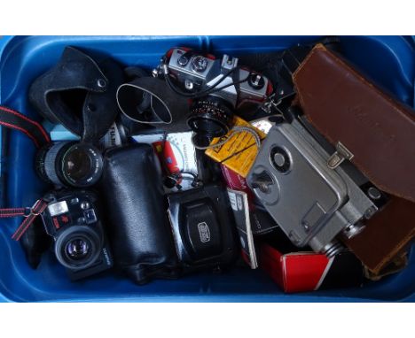 A box of cameras and related equipment, including Olympus, Praktica, and an Admica movie camera 