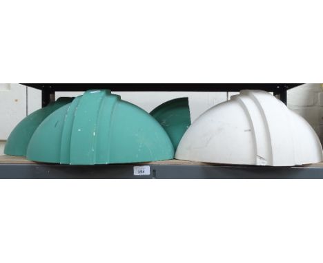 A set of 7 Art Deco style wall light shades, length 39cm 