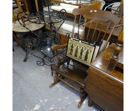 A pair of black painted wirework occasional tables, a stick-back rocking chair, and a magazine rack 