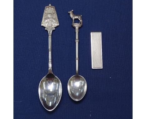 An engine turned silver money clip, and 2 hallmarked silver spoons, London and Middlesex Rifle Association, Lynton 