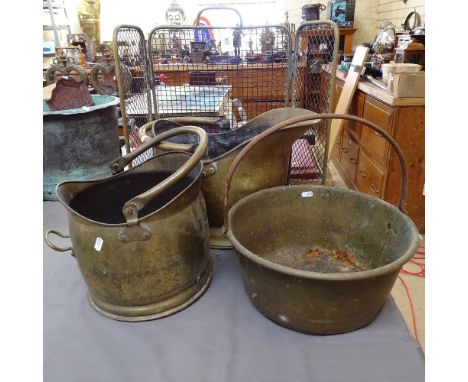2 brass coal scuttles, a brass mesh fireguard, jam pan, and a shovel 