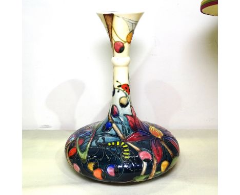 A Moorcroft vase with tube-lined butterfly and floral decoration, 23cm 