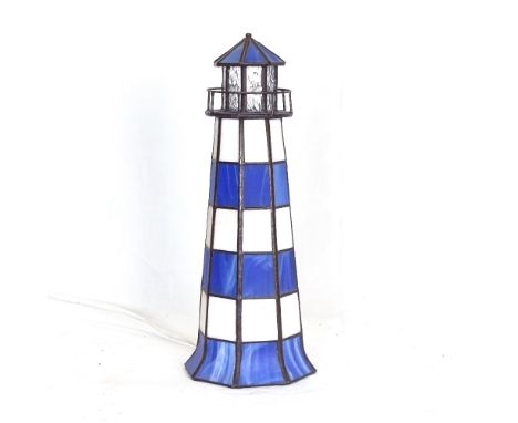 A Tiffany style leadlight blue and white lighthouse lamp, height 27cm 