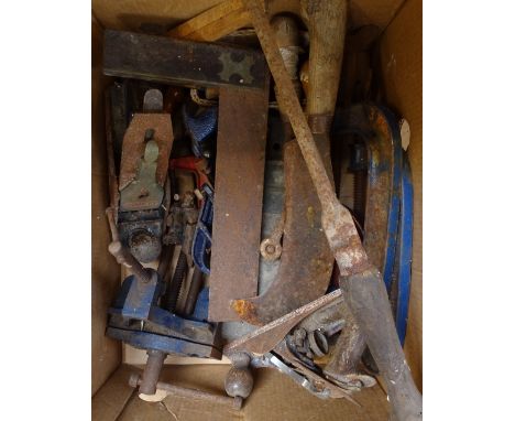 A box of tools, including planes and a bill hook 