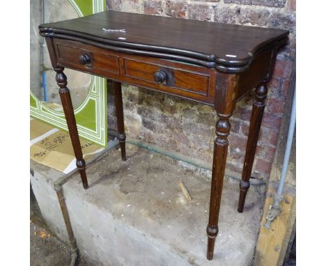 A reproduction mahogany foldover card table, with shaped top, raised on fluted legs, W78cm, H78cm 