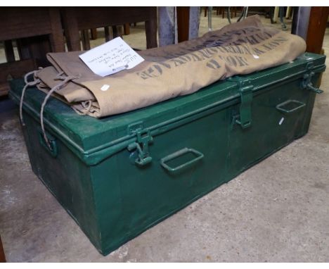 A World War II blanket/bed roll, taken to India with Captain H Hudson in the PAY Corps, and a green painted military trunk 