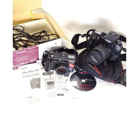 A Canon Eos 30 camera, and a boxed Canon Powershot G5 digital camera (2) 