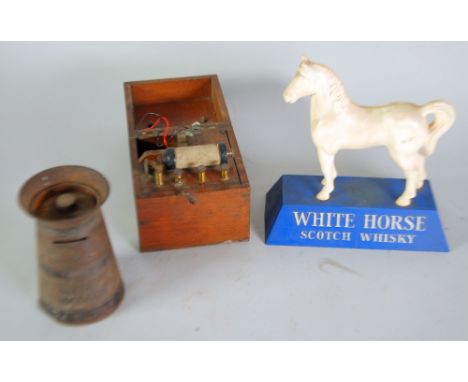 T.D. LAWRENCE, SMALL LATE NINETEENTH CENTURY BATTERY POWERED ELECTROTHERAPHY MACHINE, the interior of the mahogany box with c