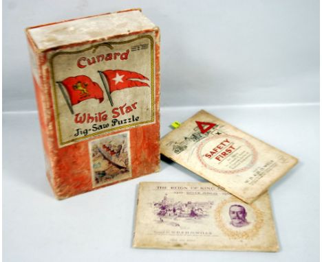 A CUNARD WHITE STAR LINE 'QUEEN MARY IN TRAFALGAR SQUARE' JIGSAW PUZZLE, in original box, also two Wills booklets of 'Safety 