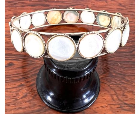 SILVER COLOURED HAND MADE MOTHER OF PEARL BANGLE, SIXTEEN ROUNDALS