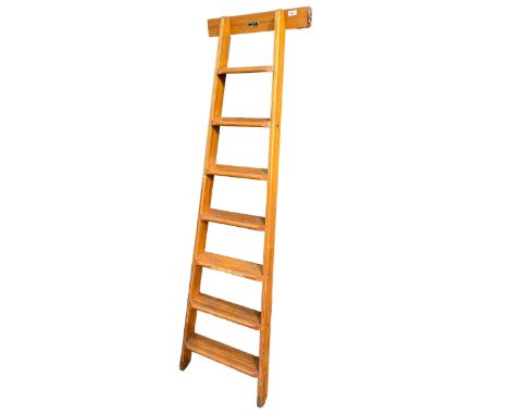 A set of Library steps/ladder, stamped Cayless Battersea SW8 