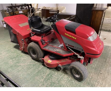 A garden tractor mower, SEE IMAGES for maker and condition. Sold as seen. Not tested. Working with previous owner. 
