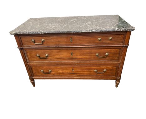 A Continental commode chest of three long drawers, with a marble top, column supports and brass handles , 129cmW x 60 cm x 80