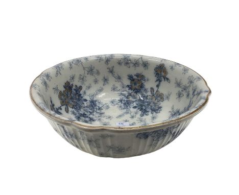 Large ceramic wash bowl with gilt and floral decoration 