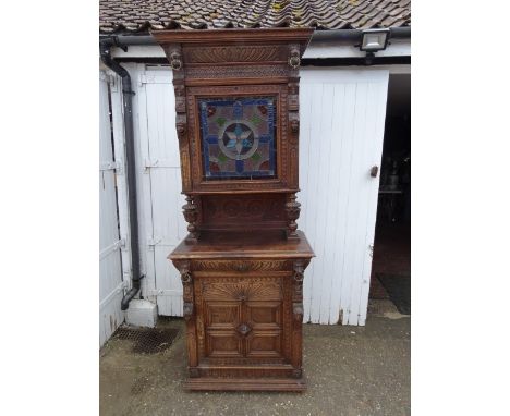 19th century flemish oak and stain glass cabinet circa 1890. Narrow flemish cabinet comprising of 2 sections with stained gla
