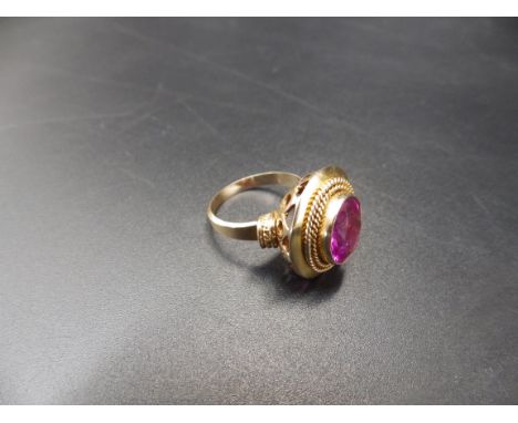 Unhallmarked but tests as gold, oval cut Tourmaline ring size O 6.49g Total weight.