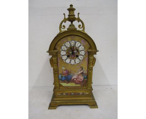 An unusual table clock with gilded frame and painted dial 48cmH