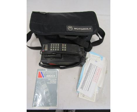 Circa 1988 Motorola 4800x cellular mobile phone with accessories, manual and bag