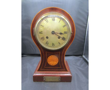 An inlaid balloon shaped mantel clock with inscription plate&nbsp;