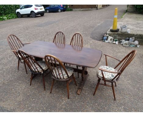 Ercol kitchen table with 6 chairs with pads