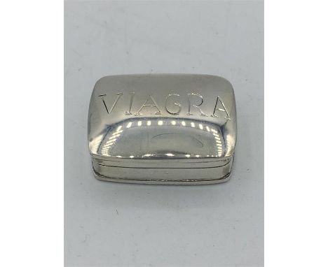 A Sterling silver pill box with 'Viagra' on the front.