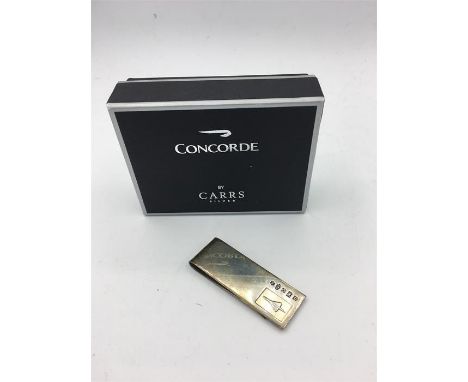 A hallmarked 'Concorde' silver money clip in original box