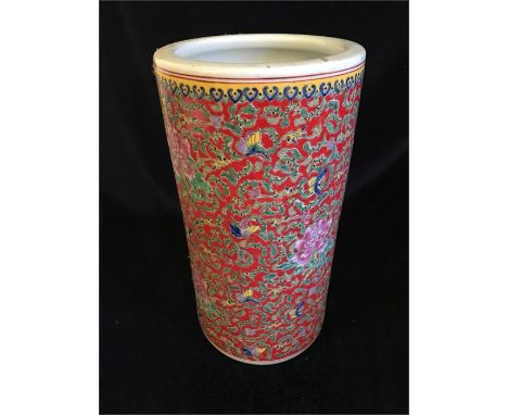 A ceramic umbrella stand