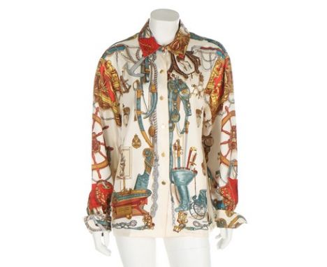 An Hermès 'Bateau à Vapeur' silk blouse, 1980s-90s, labelled size 44, design by Philippe Ledoux, with gilt buttons and nautic