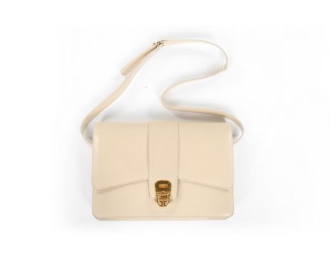 Five designer handbags, 1980s-90s, comprising beige Gucci leather shoulder bag with gilt 'G' clasp; Gucci 'Speedy' in navy le