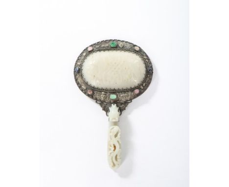 A Chinese elaborately carved hardstone mirror and assorted vanity accessories, 1920s-30s, comprising: silver mounted green gu