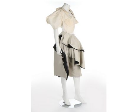 A Comme des Garçons ensemble, Autumn-Winter 2003, comprising: white calico backless bodice with curved patch pockets and sing