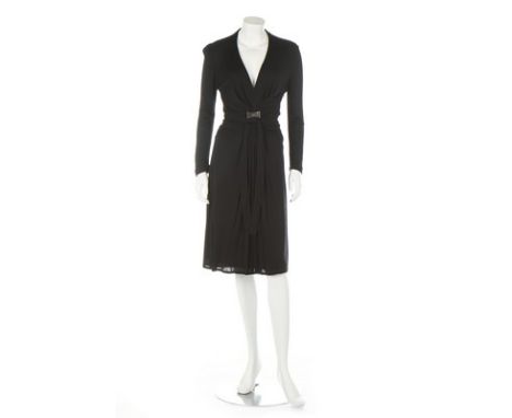 A Gucci viscose black dress, 2007, labelled, with metal bow-pin to waist, bust approx 86cm, 34in; together with an Alexander 