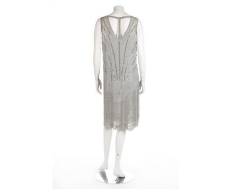 An ice blue-chiffon couture flapper dress, circa 1928, un-labelled, studded with rhinestones and a shimmer of silver beads, d